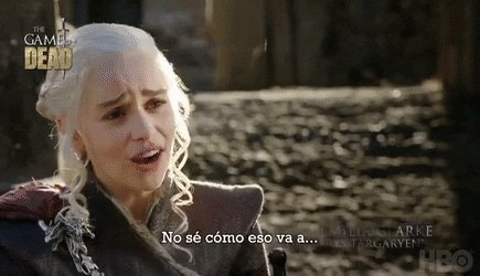 An image of Emilia Clarke from Game of Thrones, dressed in a fur robe with her platinum hair in a braid making a funny face