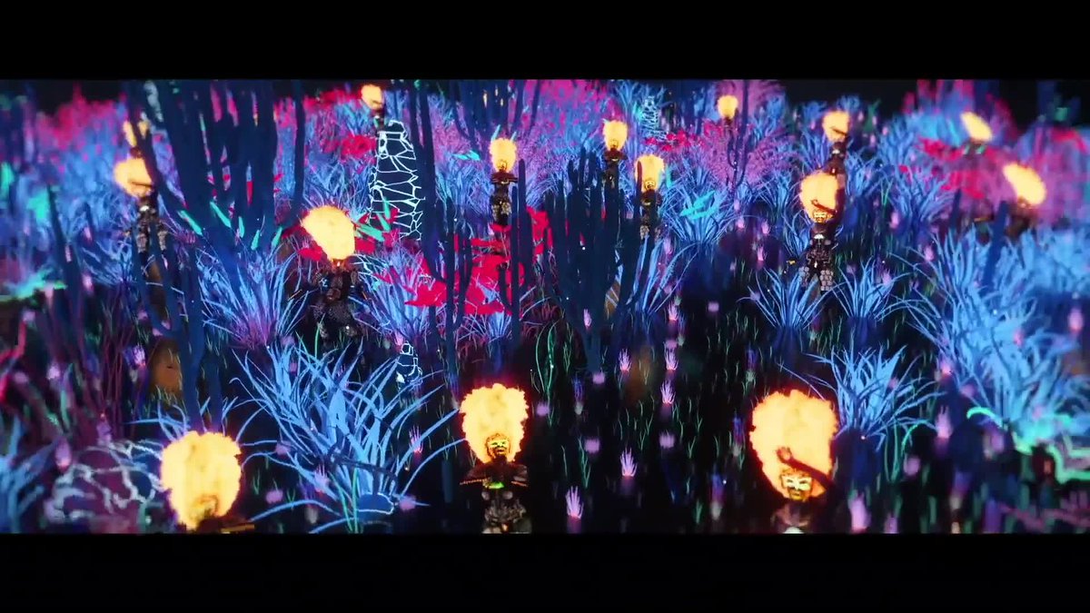 A psychedelic image of blue explosions and orange glowing lights